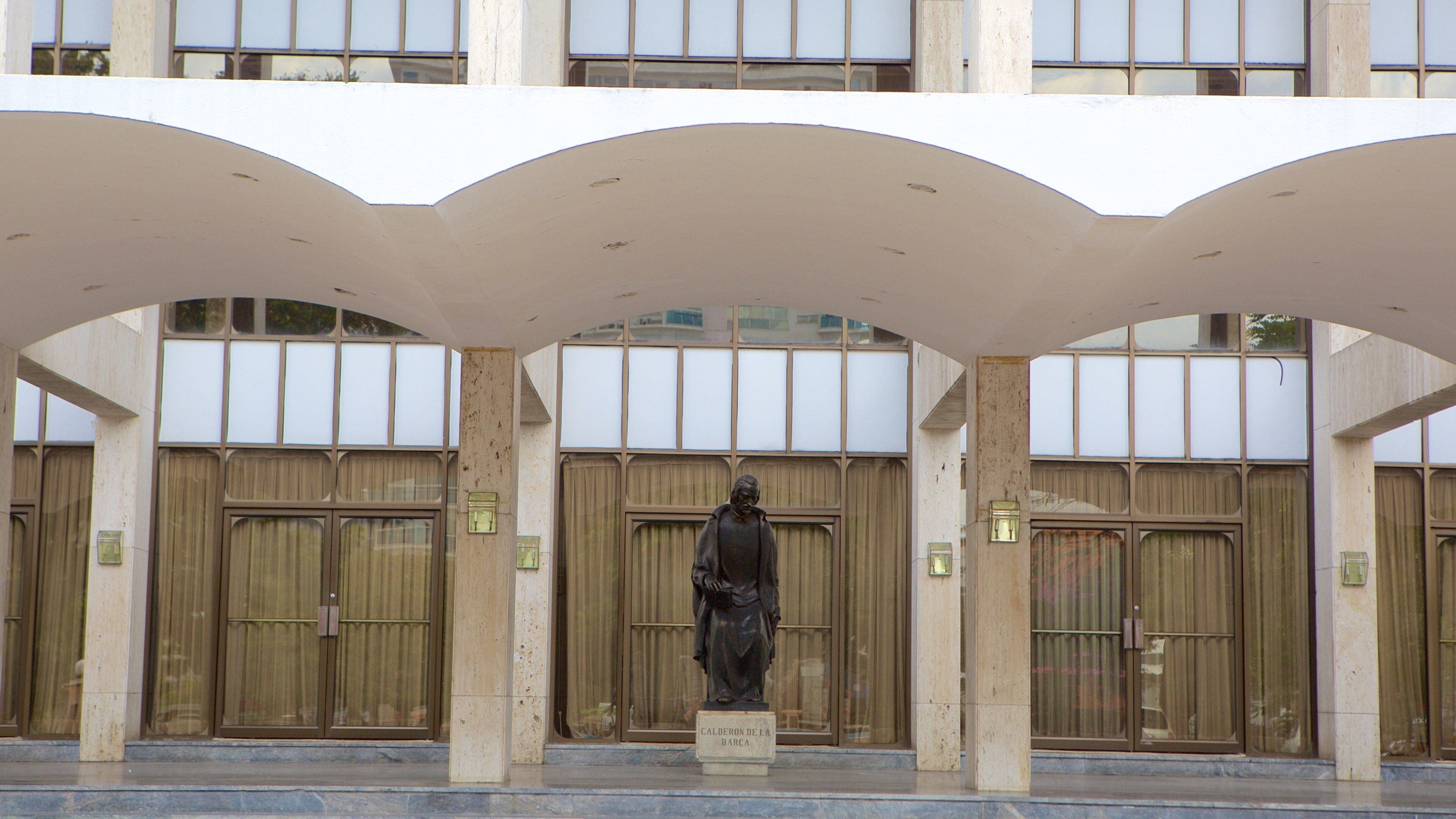Plaza de la Cultura which includes signage, a square or plaza and a statue or sculpture