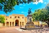 Columbus statue and Basilica Cathedral of Santa Maria la Menor in Santo Domingo Colonial zone. Parque Colon