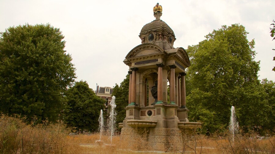 Sarphatipark showing a monument, a fountain and a park