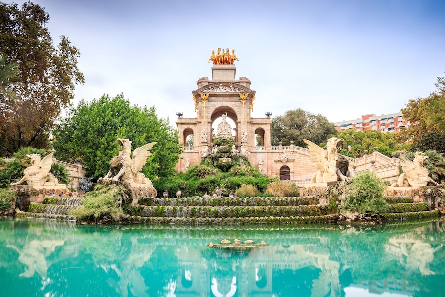 Cascada Monumental fountain at Ciutadella Park in Barcelona, surrounded by lush greenery.