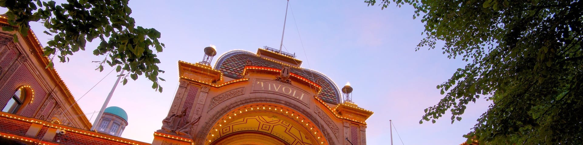 Tivoli Gardens which includes heritage architecture and rides