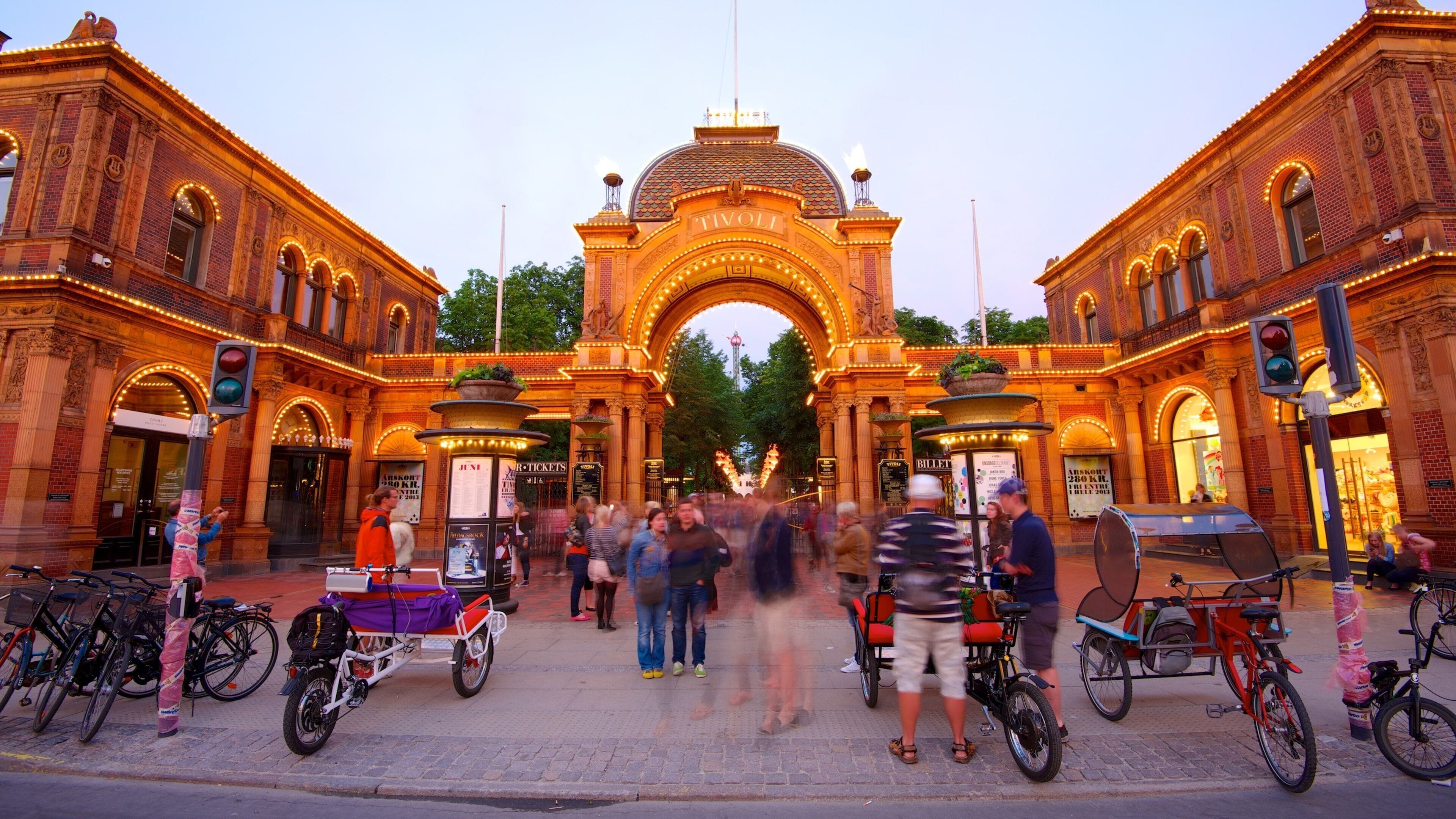 Tivoli Gardens showing heritage architecture, rides and a city