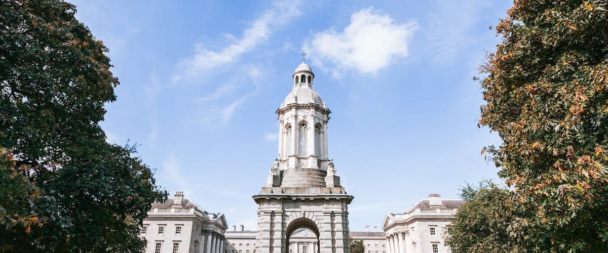 Trinity College showing heritage architecture and a park
