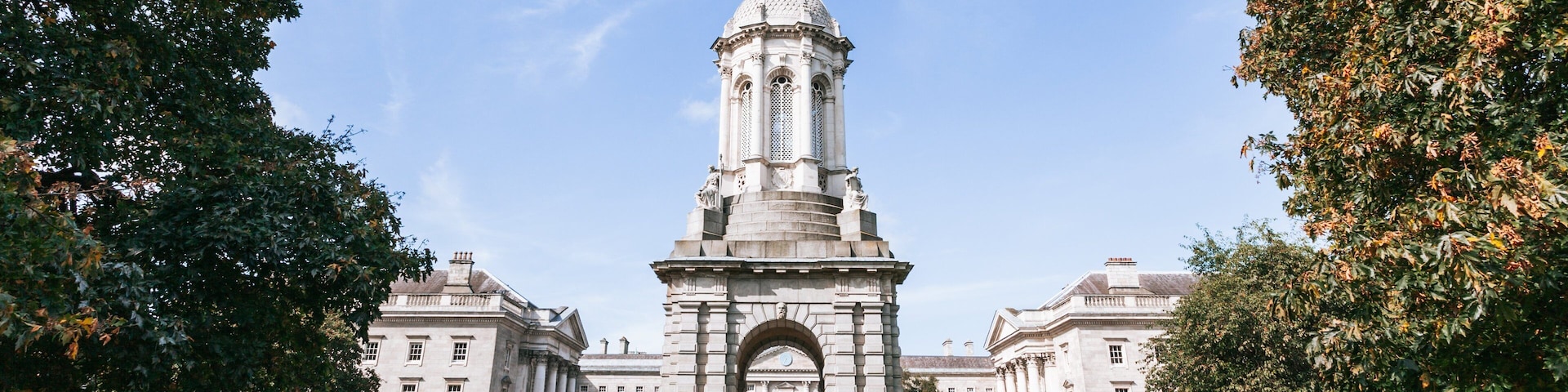 Trinity College showing heritage architecture and a park