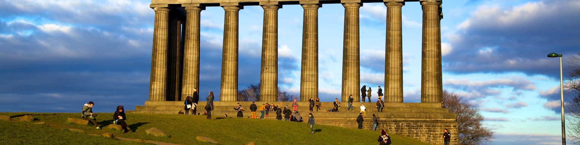 Calton Hill which includes heritage architecture, a monument and hiking or walking