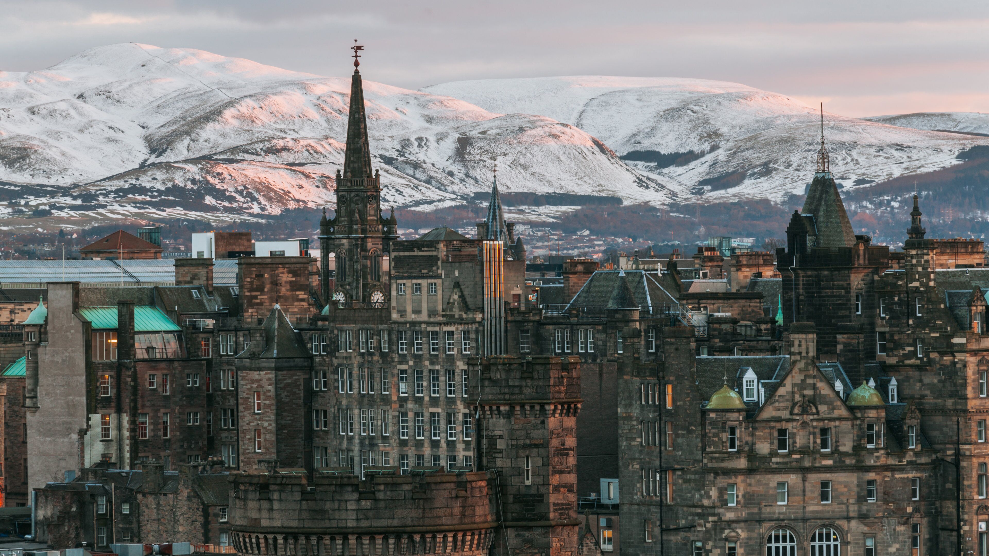 Calton Hill featuring a city, a sunset and heritage architecture