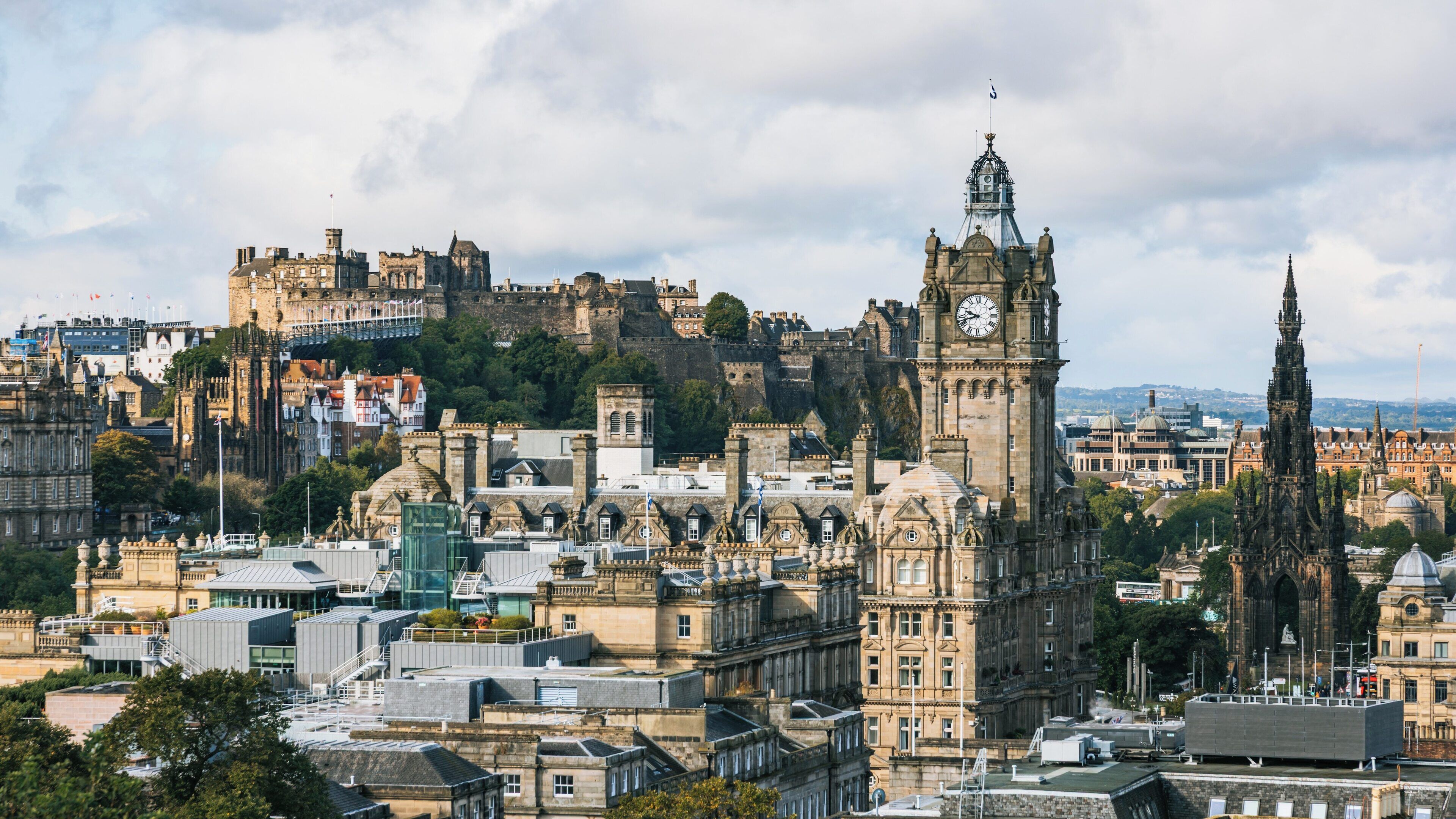 Calton Hill offers stunning views of Edinburgh's skyline, showcasing historic architecture and natural beauty in Scotland