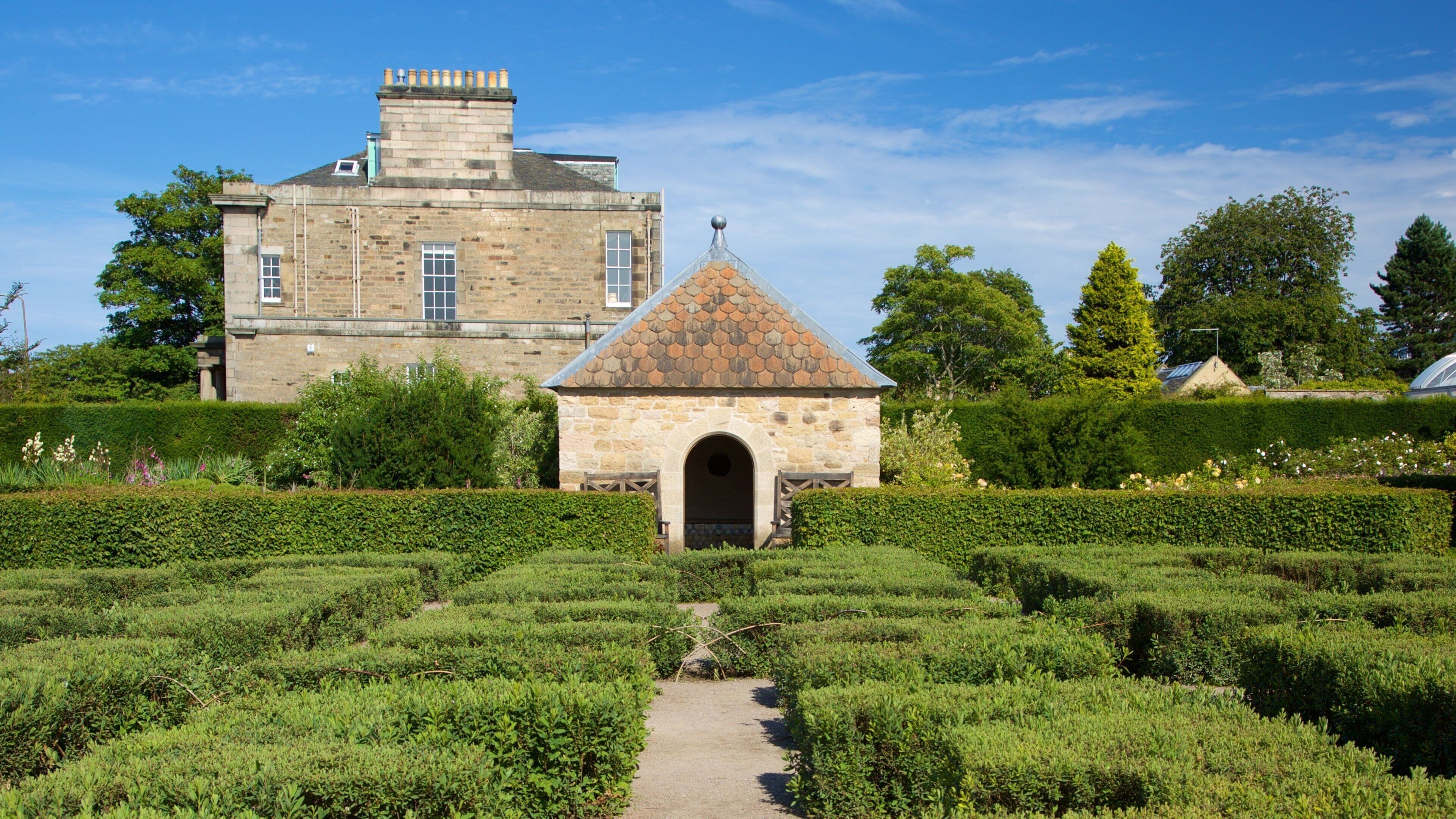 Real Jardín Botánico mostrando elementos del patrimonio y un jardín