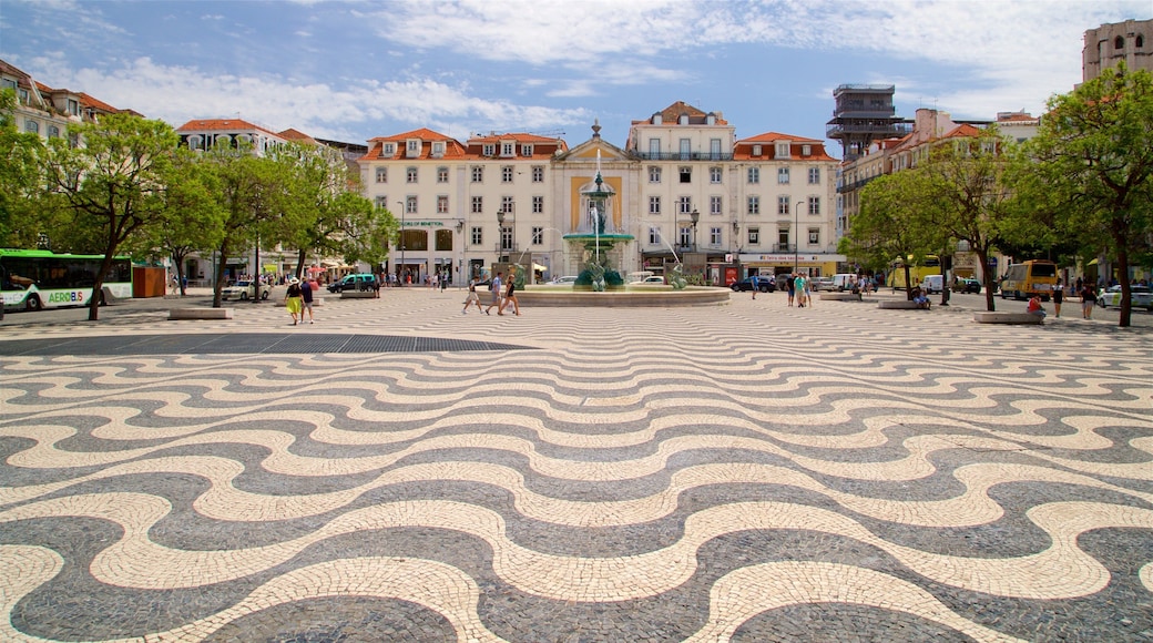Plaza Rossio que incluye un parque o plaza y una fuente