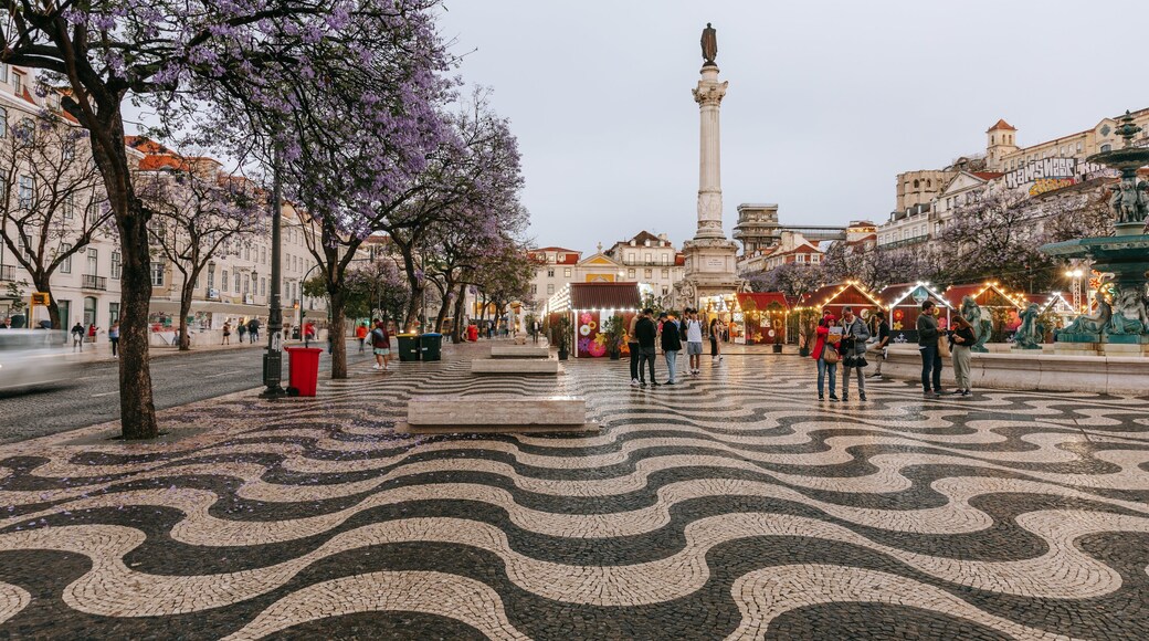 Rossio Square featuring a statue or sculpture and a square or plaza