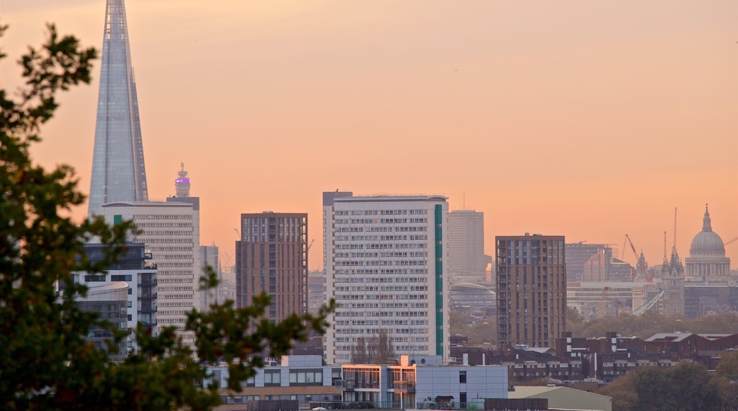 Greenwich Park which includes a sunset, a city and landscape views