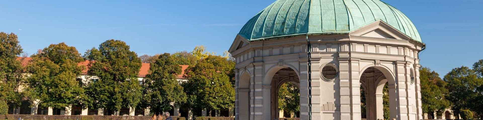 Hofgarten which includes a park and heritage elements as well as a small group of people