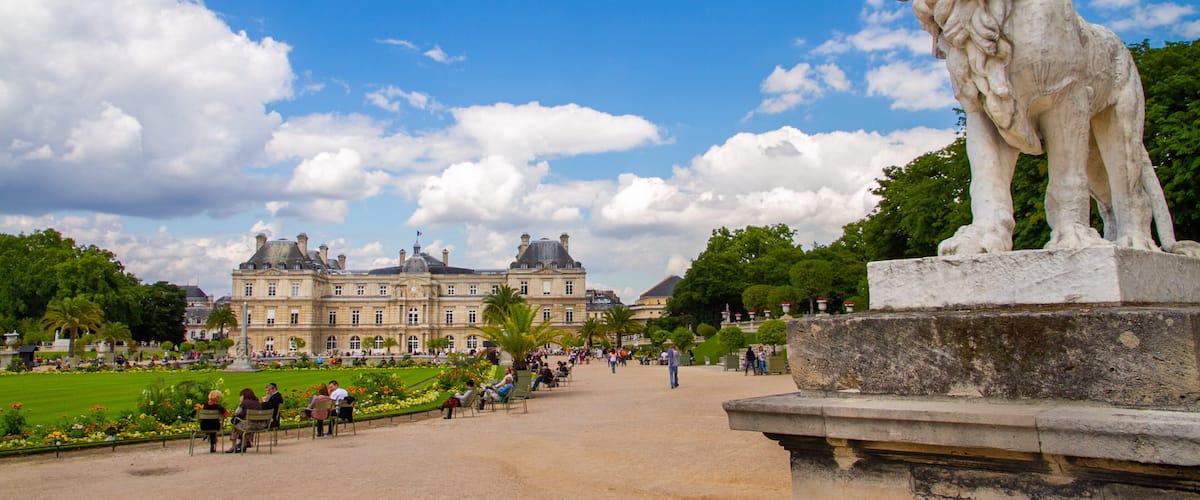 Luxembourg Gardens featuring heritage architecture and a statue or sculpture