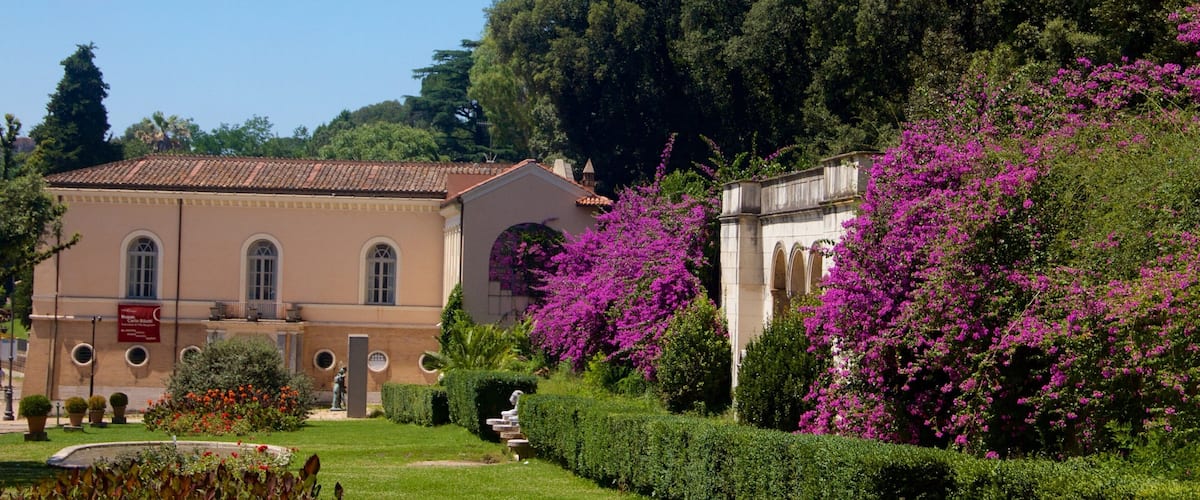 Villa Borghese showing flowers and a house