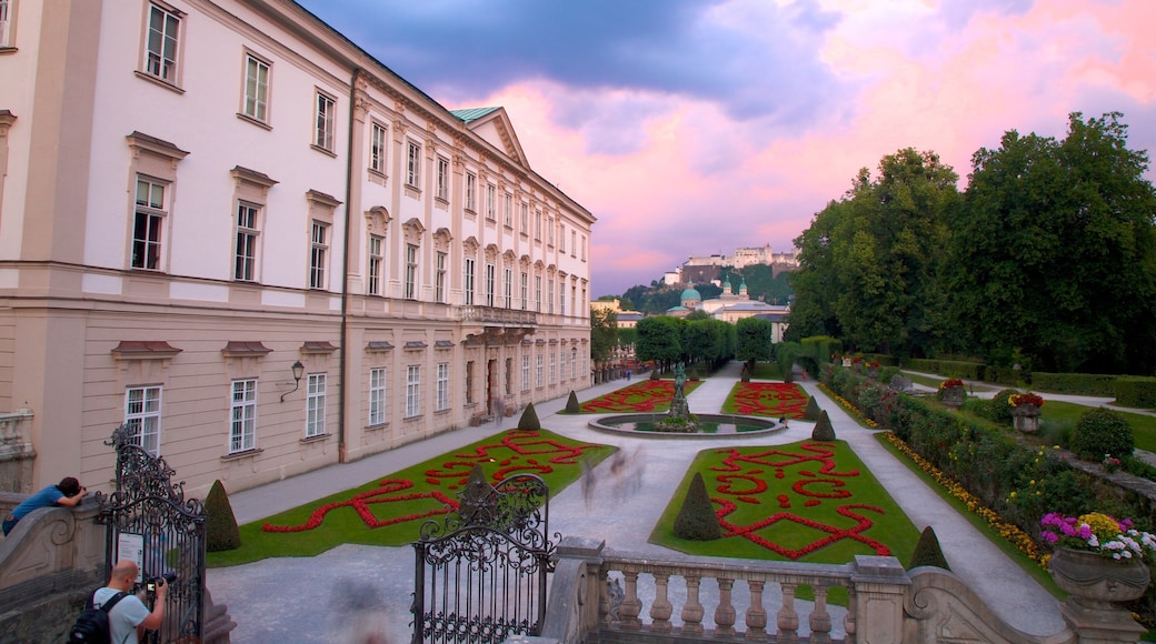 Mirabell Palace featuring chateau or palace, a sunset and heritage architecture