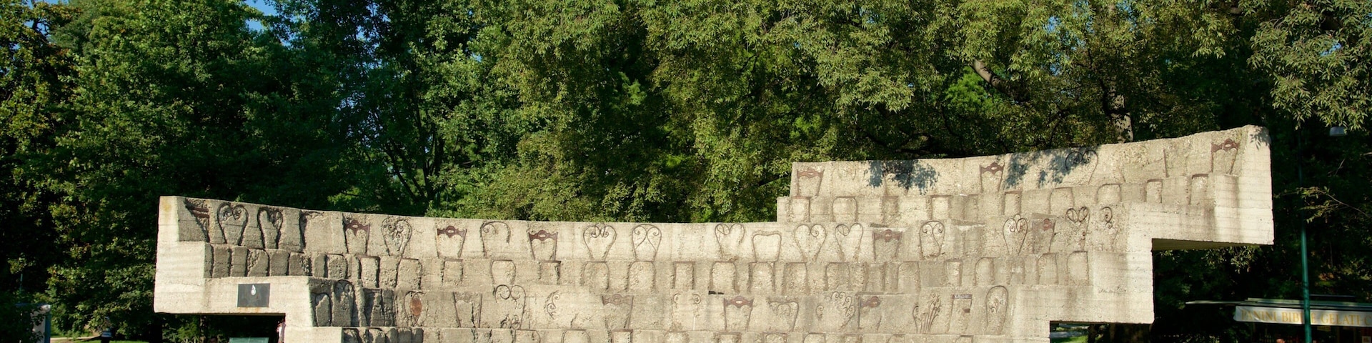 Sempione Park featuring outdoor art, a garden and a statue or sculpture