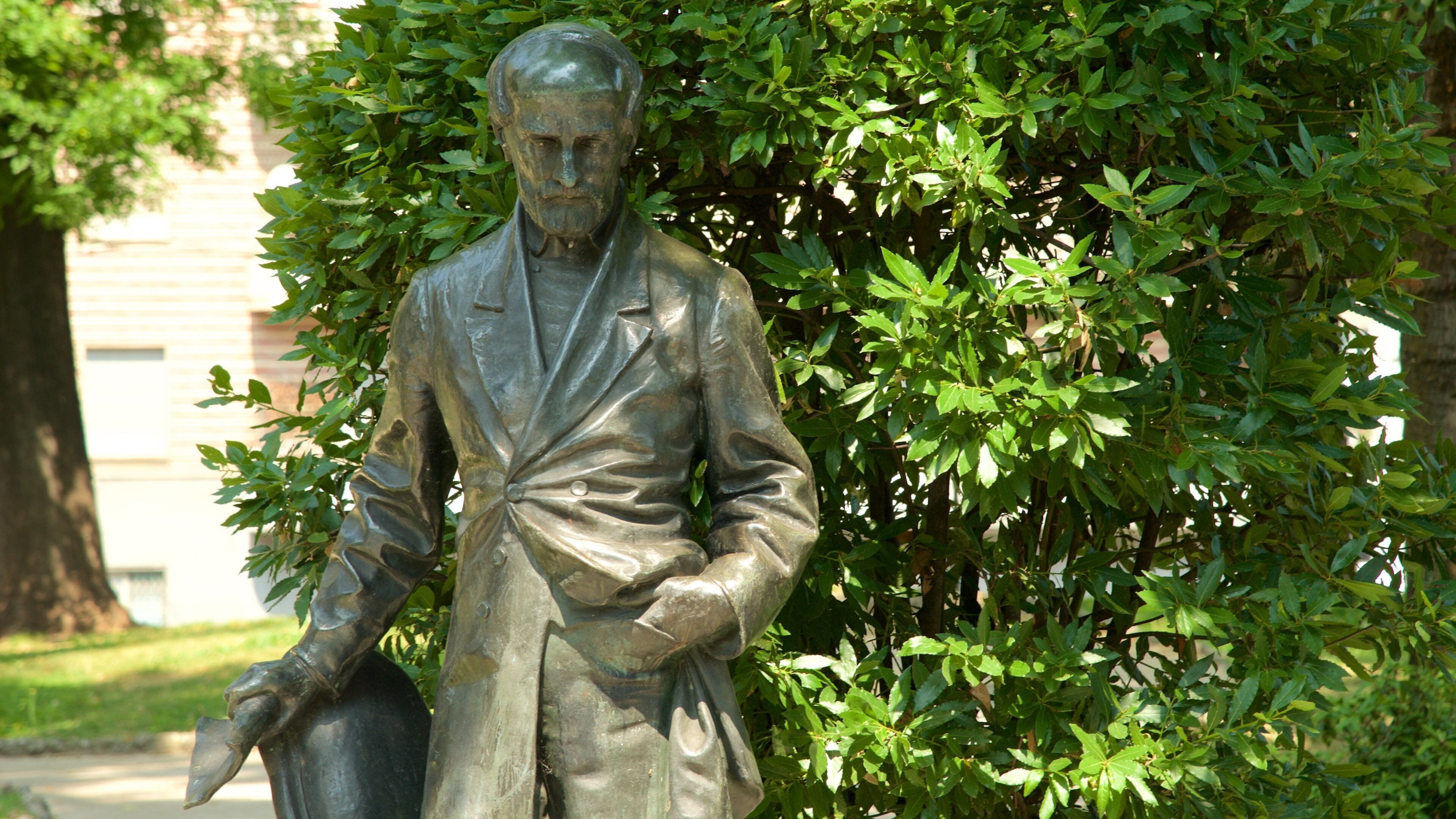Piazza della Repubblica featuring a statue or sculpture and a monument