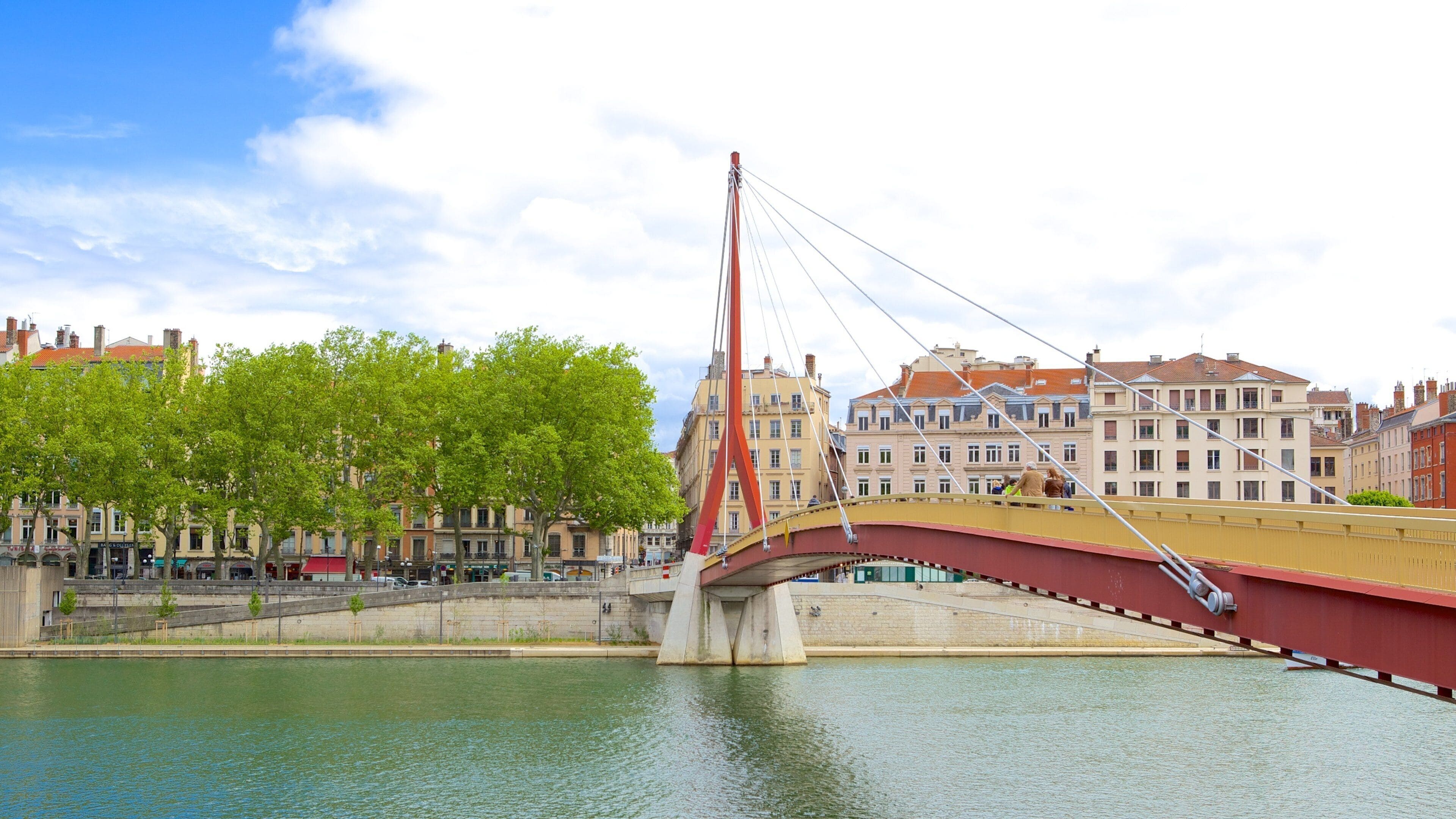Bellecour Square featuring a bridge and a river or creek