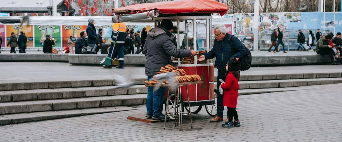 Taksim Square which includes street scenes and markets as well as a family