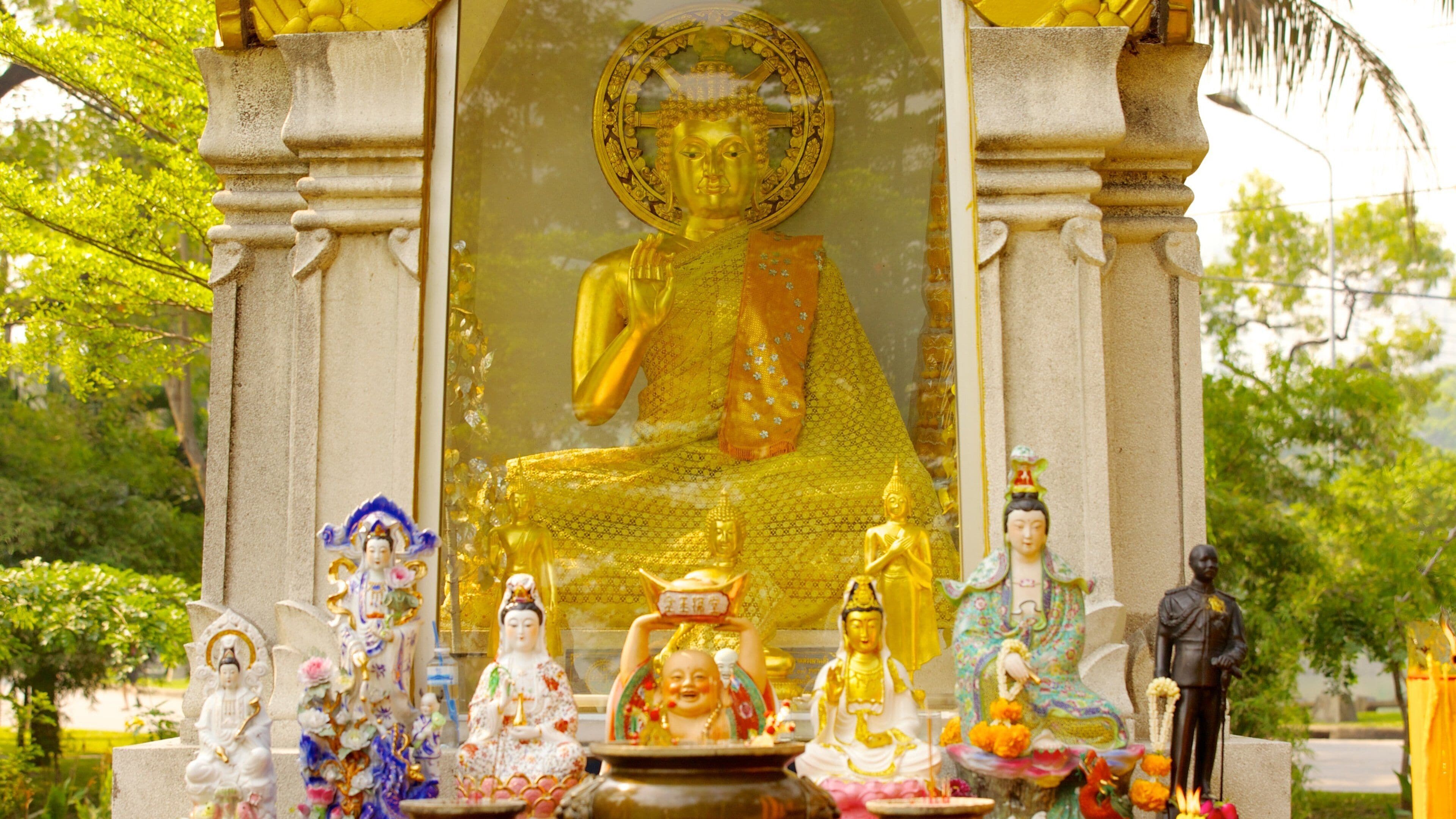 Lumpini Park which includes religious elements and a temple or place of worship