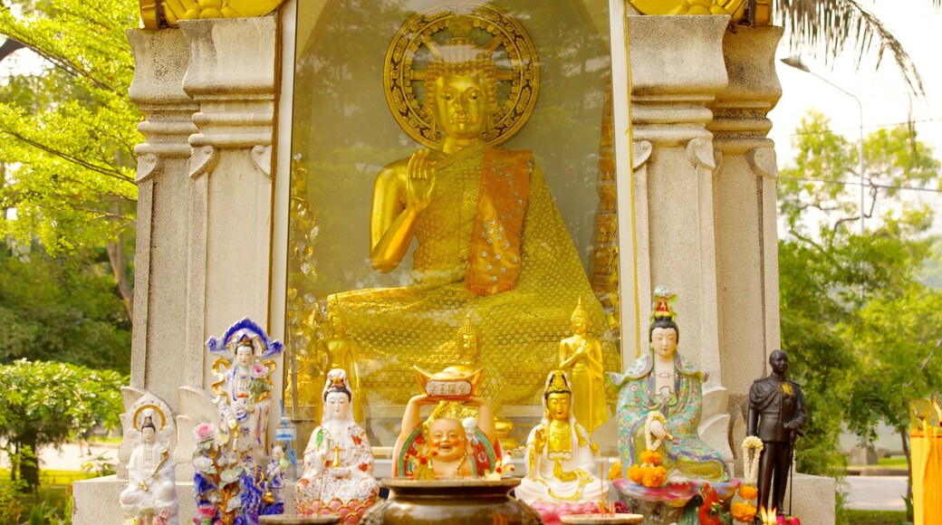 Lumpini Park which includes religious elements and a temple or place of worship