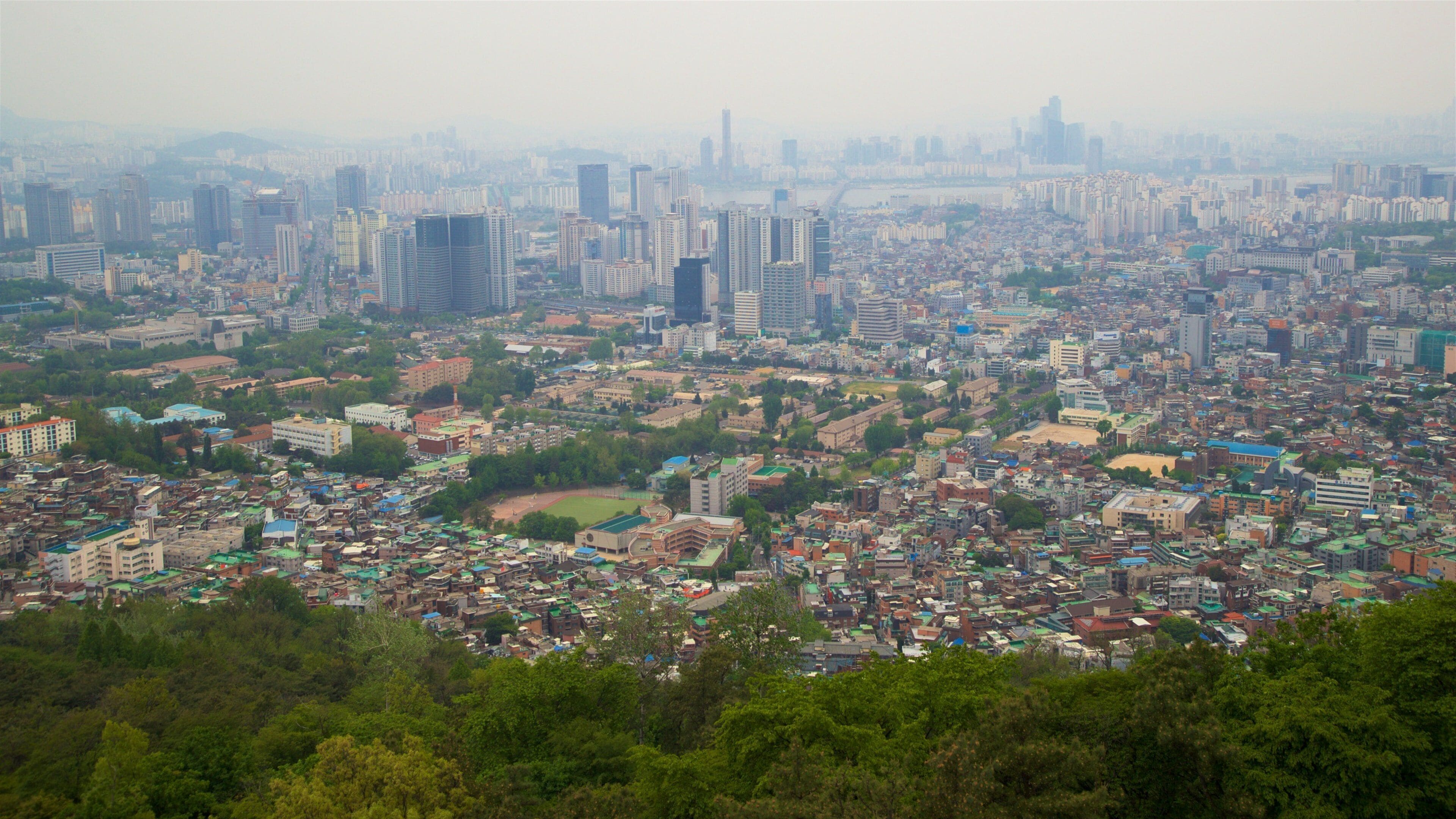 Namsan Park, Seoul, South Korea featuring landscape views, a city and mist or fog