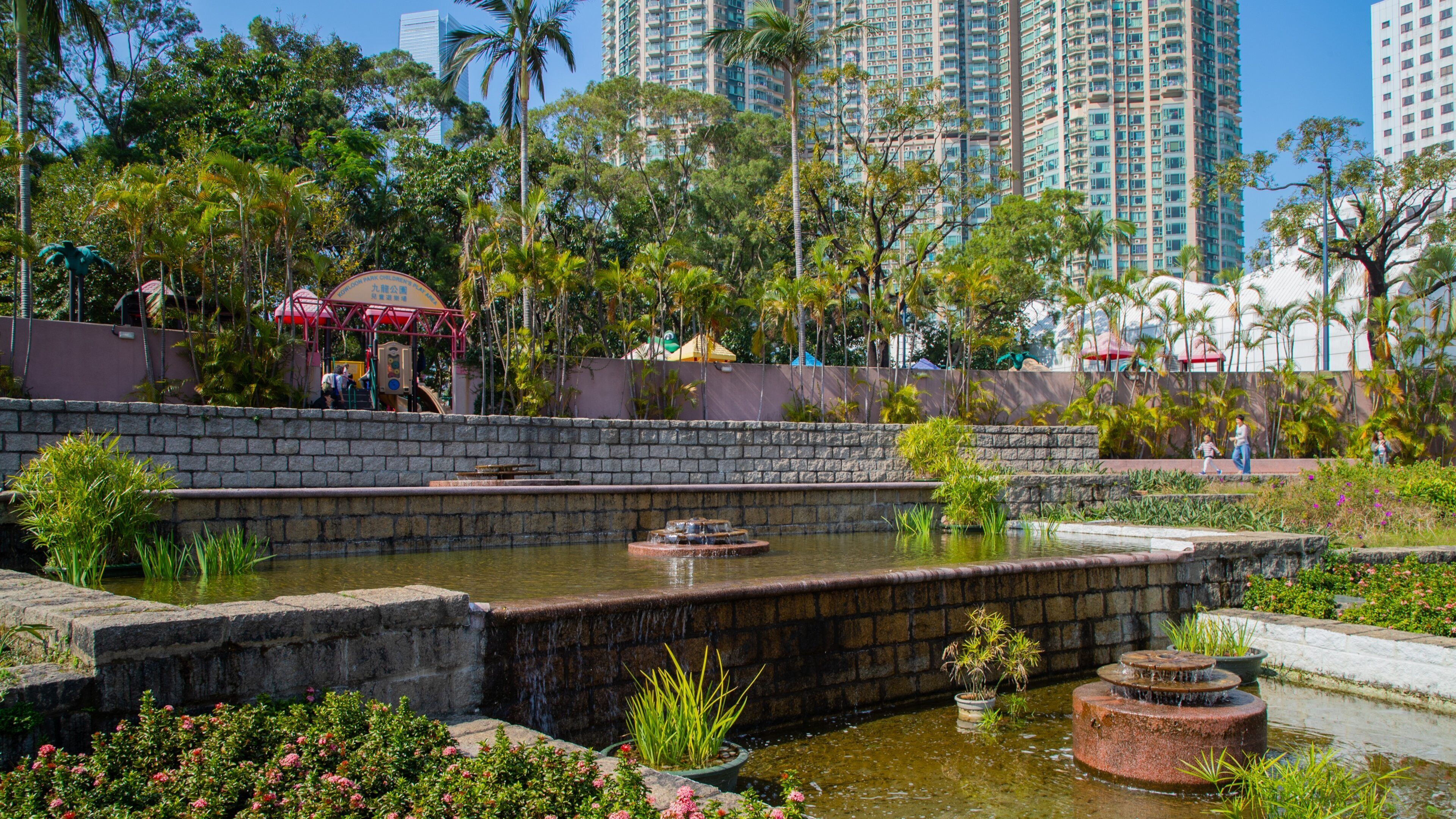 Kowloon Park which includes a pond