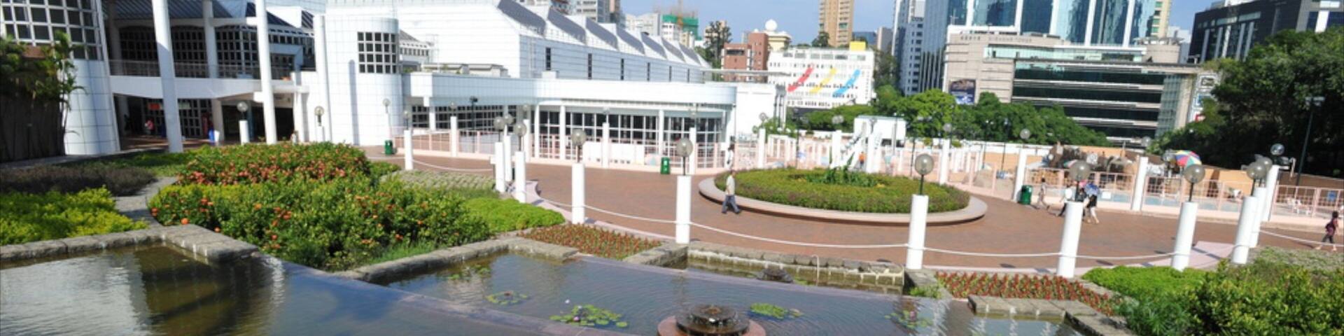 Kowloon Park which includes a city, a park and a pond