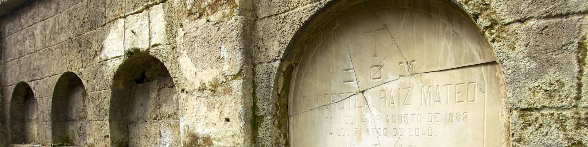 Paco Park which includes a cemetery, signage and heritage architecture
