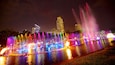 Rizal Park showing a garden, a fountain and night scenes