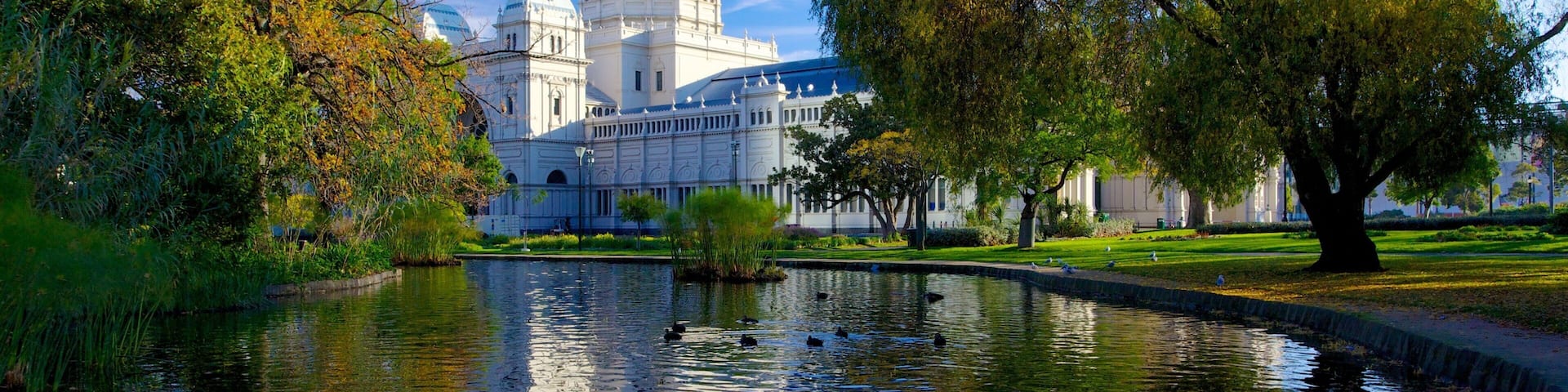 Carlton Gardens featuring a castle, a park and a pond