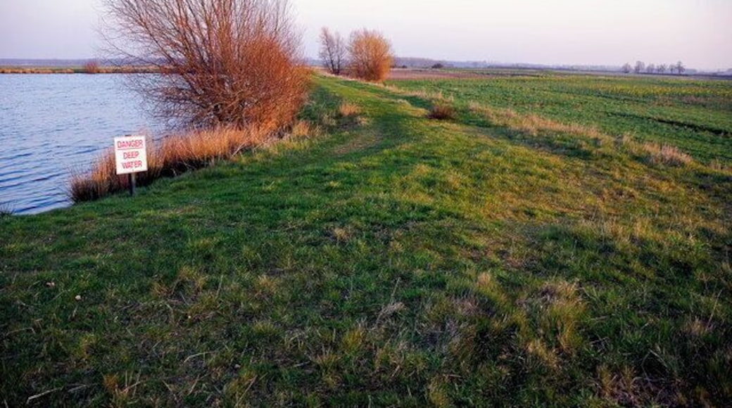 Small lake, Yaxley This small lake has been created by a large embankment. There were a number of ducks on it and the area is shown as a Nature Conservation Area.