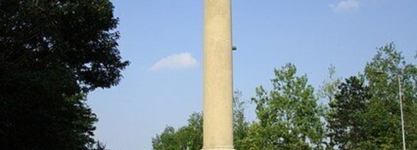 Norman Cross Napoleonic Monument A replacement Imperial Eagle crowns the monument toppled in 1990 and the eagle stolen when it stood by Norman Cross roundabout, a few metres to the west on the Great North Road. Between 1793 and 1814 more than 30,000 French prisoners of war were incarcerated in the camp that stood in the adjacent field. On 28th July 1914, exactly 100 years after the closure of the camp, the original monument was erected as a memorial to the 1,770 men who died there. The replacement bronze eagle by sculptor John Doubleday was placed atop the re-sited column and re-dedicated by the 8th Duke of Wellington on 2nd April 2005.