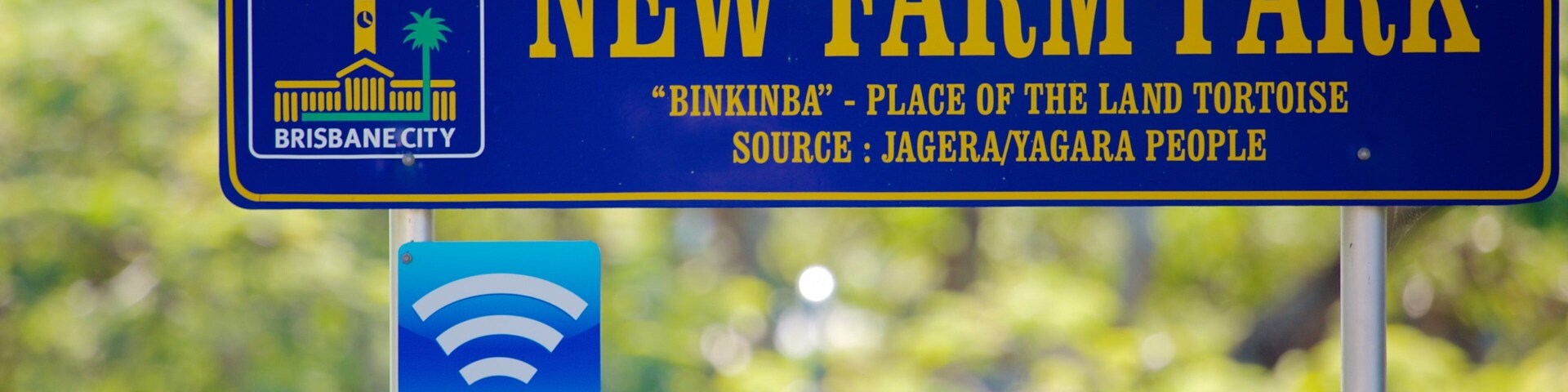 New Farm Park which includes a park and signage