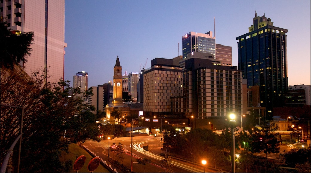 King George Square which includes night scenes and a city