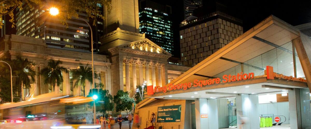 King George Square featuring night scenes, a city and street scenes