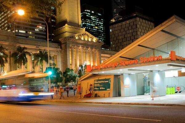 King George Square featuring night scenes, a city and street scenes
