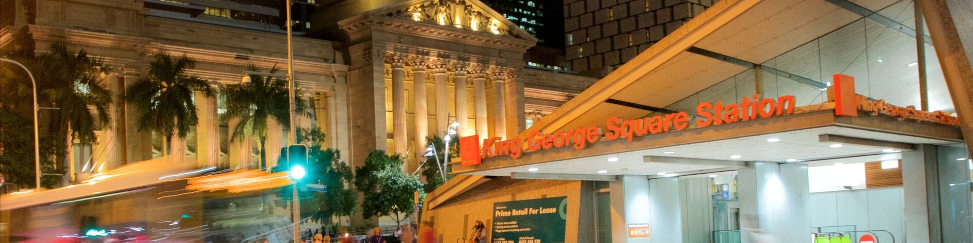 King George Square featuring night scenes, a city and street scenes