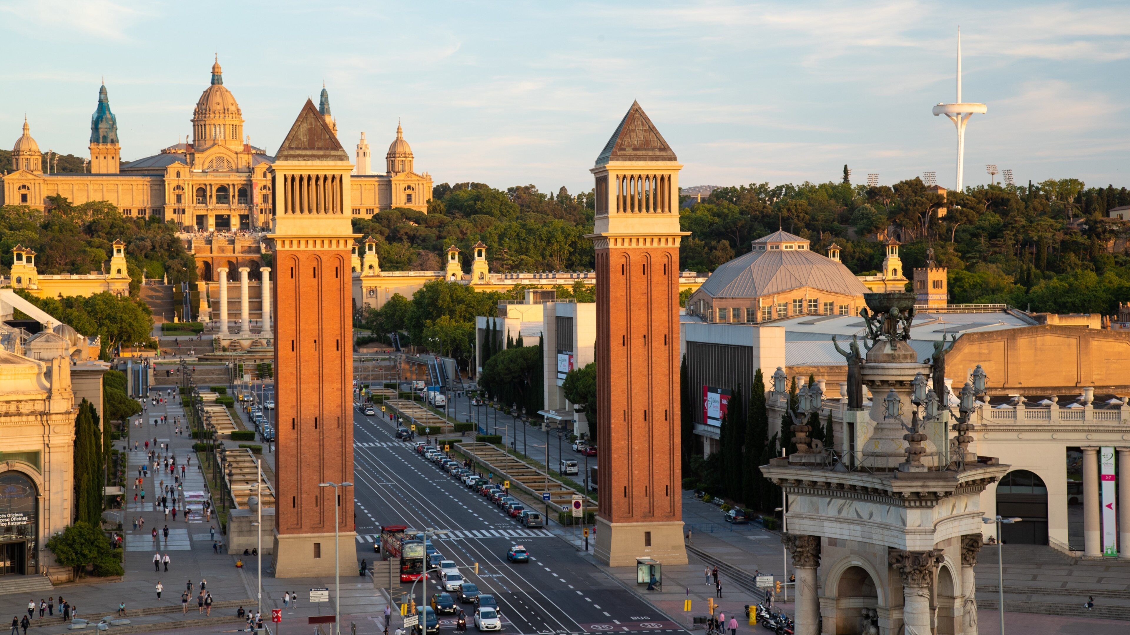 Placa d\'Espanya showing heritage elements, landscape views and a sunset