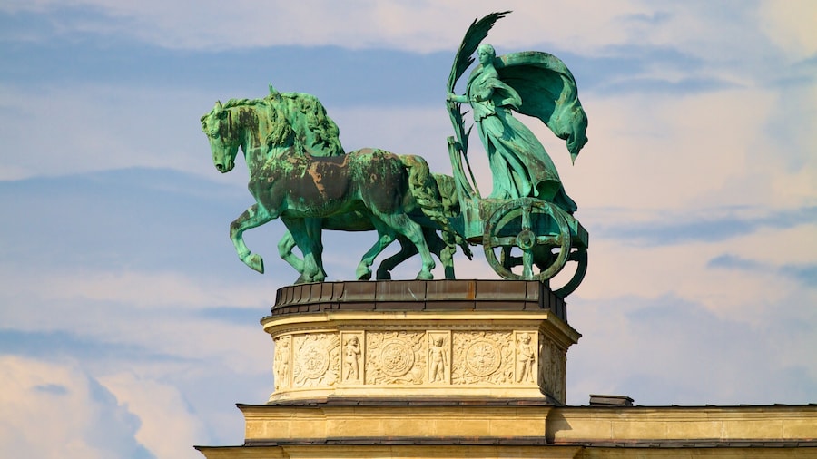 Heroes\' Square which includes a statue or sculpture, heritage elements and a square or plaza