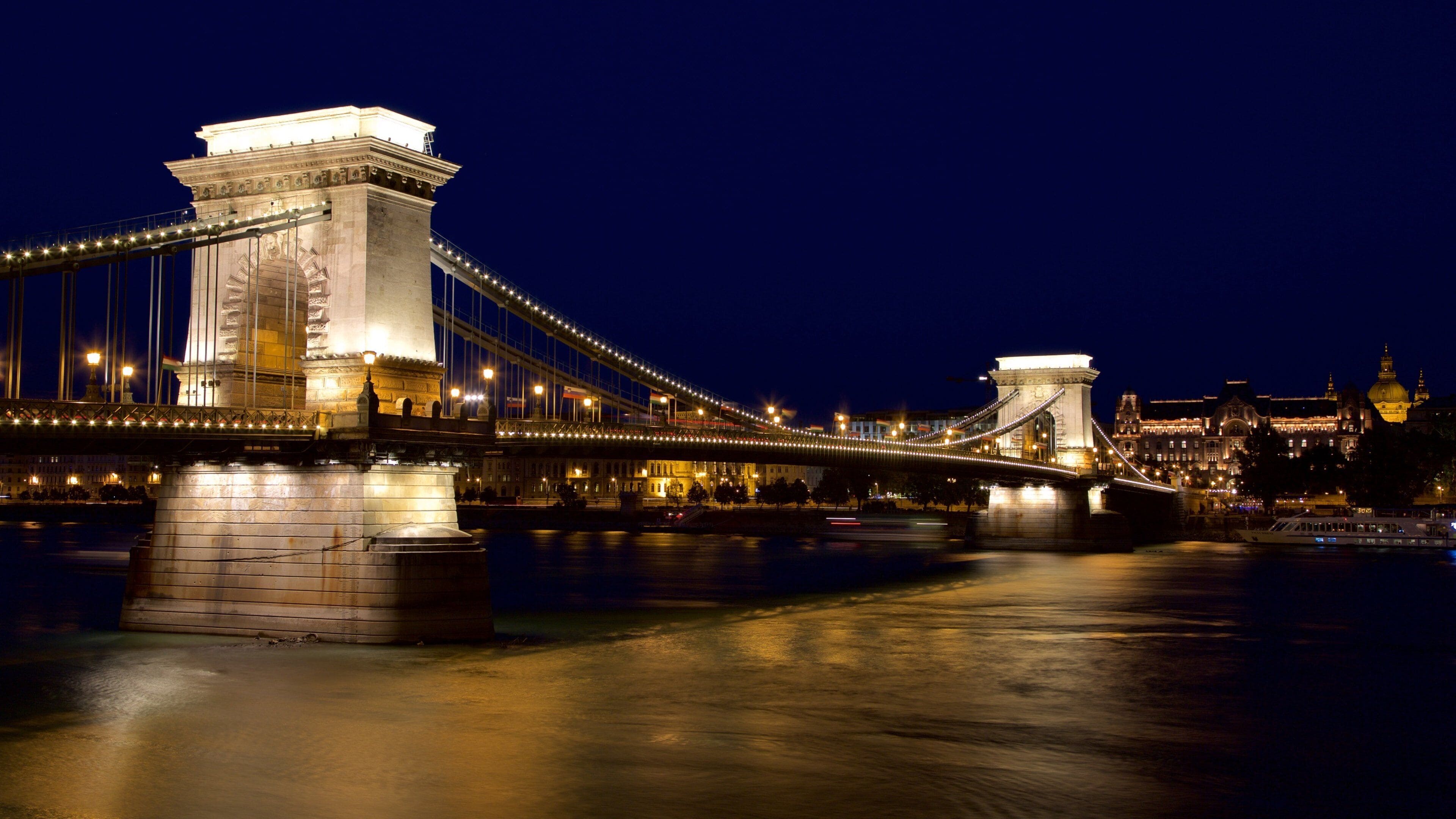 Szechenyi Chain Bridge featuring night scenes, heritage architecture and a bridge
