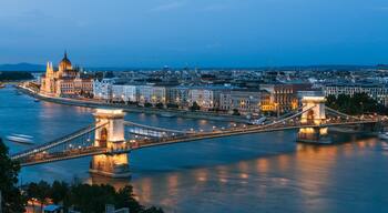 Szechenyi Chain Bridge showing a city, a river or creek and a bridge