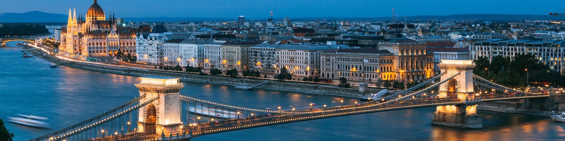 Szechenyi Chain Bridge showing a city, a river or creek and a bridge