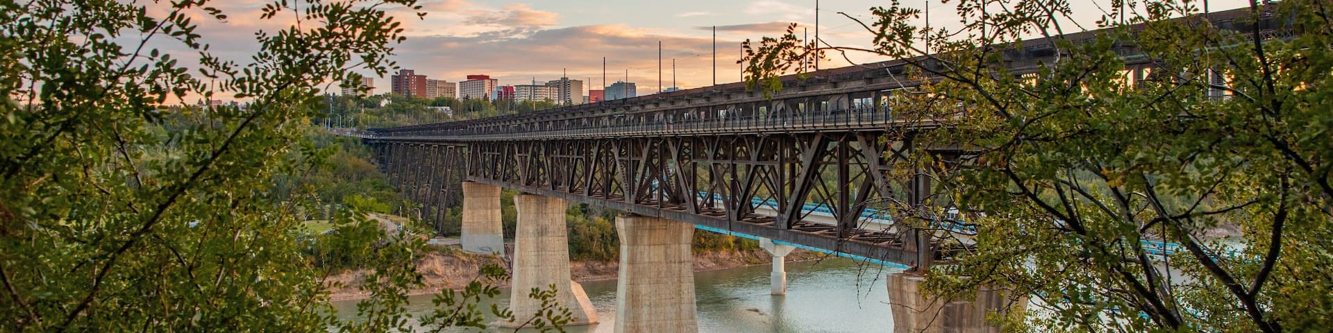 High Level Bridge featuring a river or creek, a bridge and a sunset
