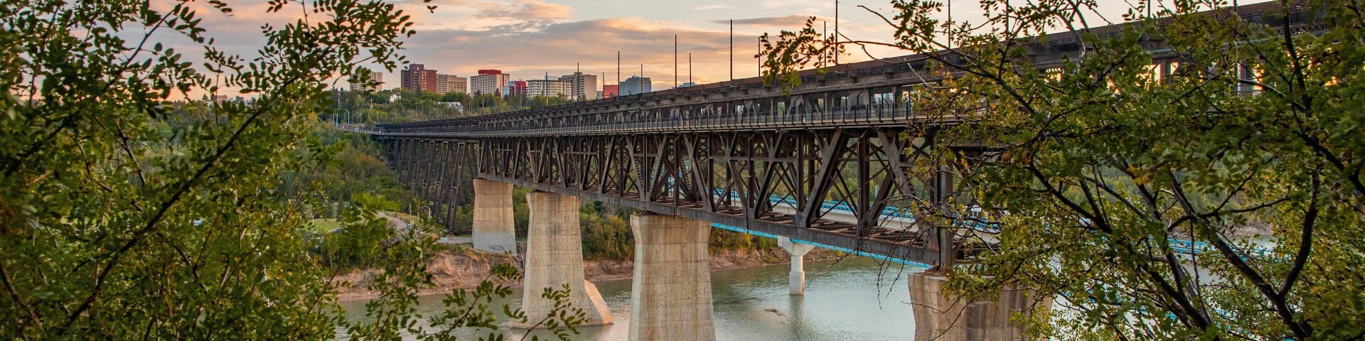 High Level Bridge featuring a river or creek, a bridge and a sunset