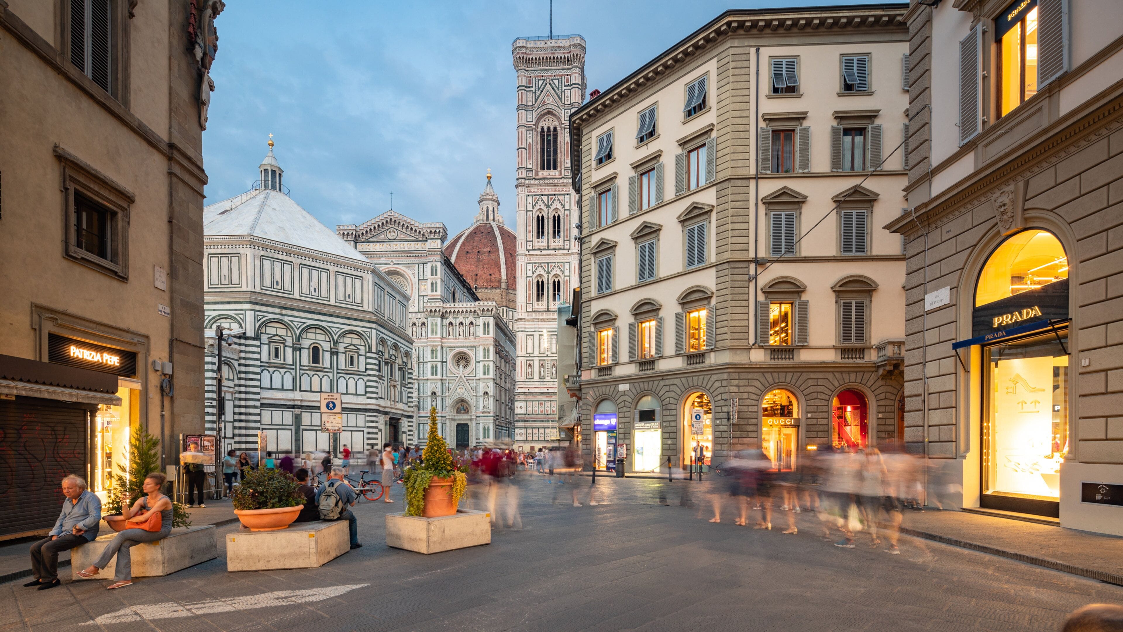 Piazza del Duomo which includes heritage architecture, night scenes and a city