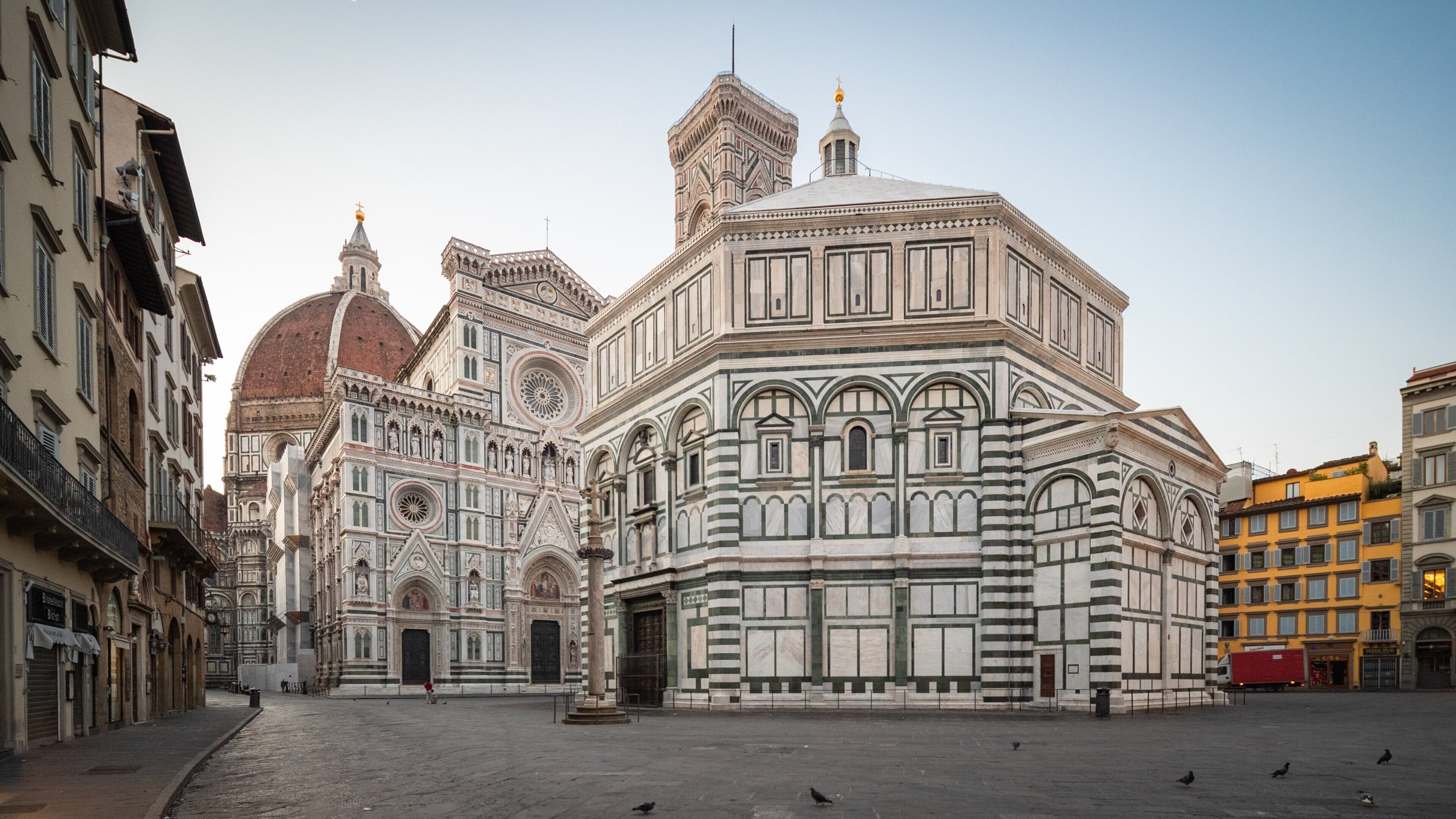 Piazza del Duomo featuring heritage architecture, a city and a sunset