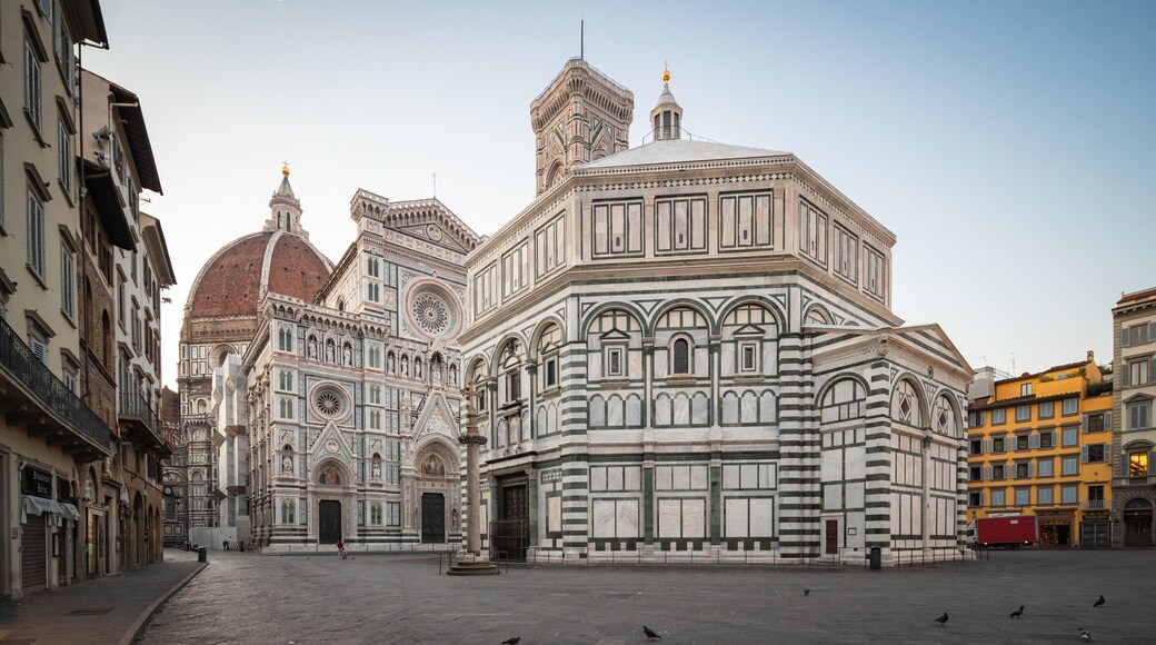 Piazza del Duomo featuring heritage architecture, a city and a sunset