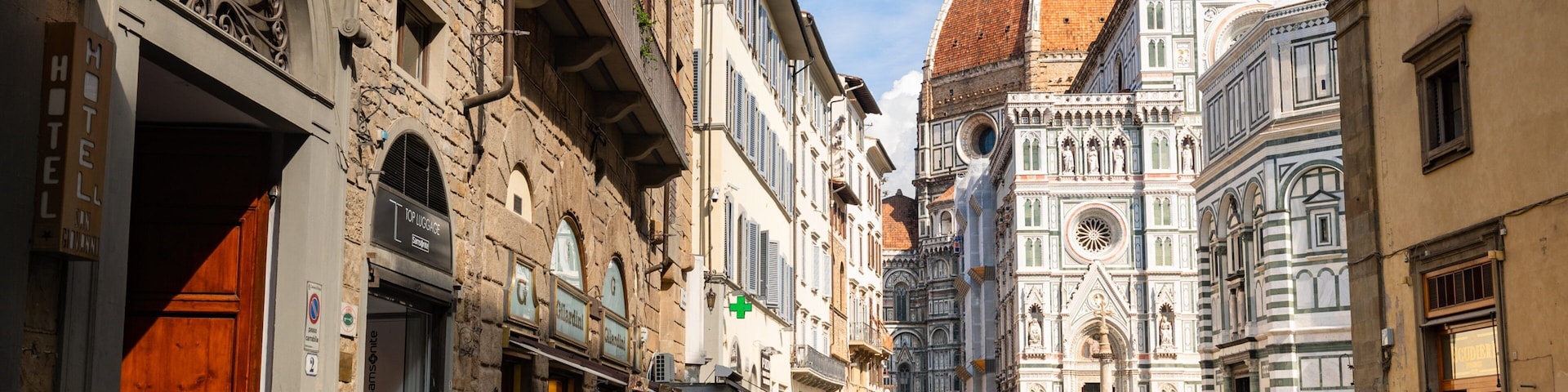 Piazza del Duomo which includes night scenes, a city and heritage architecture