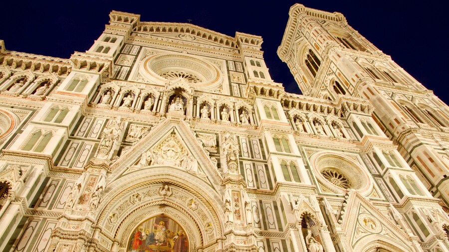 Piazza del Duomo which includes a church or cathedral, night scenes and heritage architecture